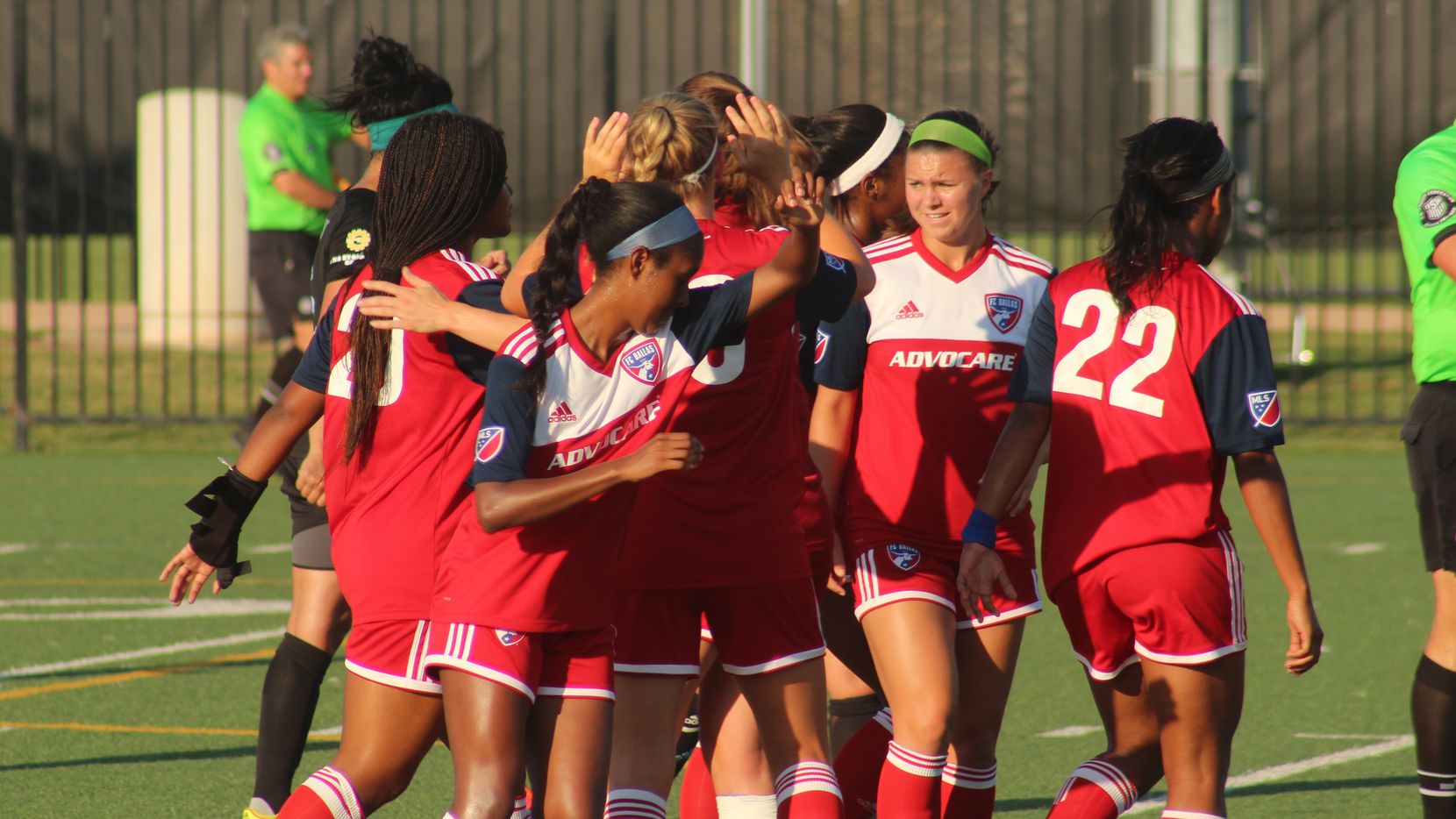 Toyota Soccer Center, Frisco TX (June 22, 2018): FC Dallas players congratulate Julie James on scoring the opening goal of a 5-1 win over Fortuna Tulsa.(Dan Crooke / 3rd Degree)