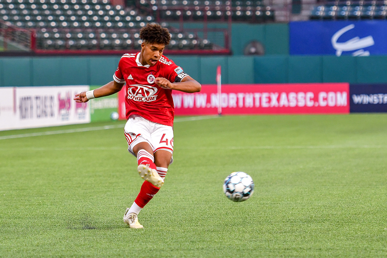 Justin Che sends a ball into the box in the first half of the USL League One match between North Texas SC and Forward Madison at Globe Life Park. (Daniel McCullough, 3rd Degree)