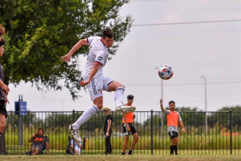 FC Dallas U19 defender Grady Easton (4) shoots at the MLS Next Showcase at Toyota Soccer Center. (Daniel McCullough, 3rd Degree)