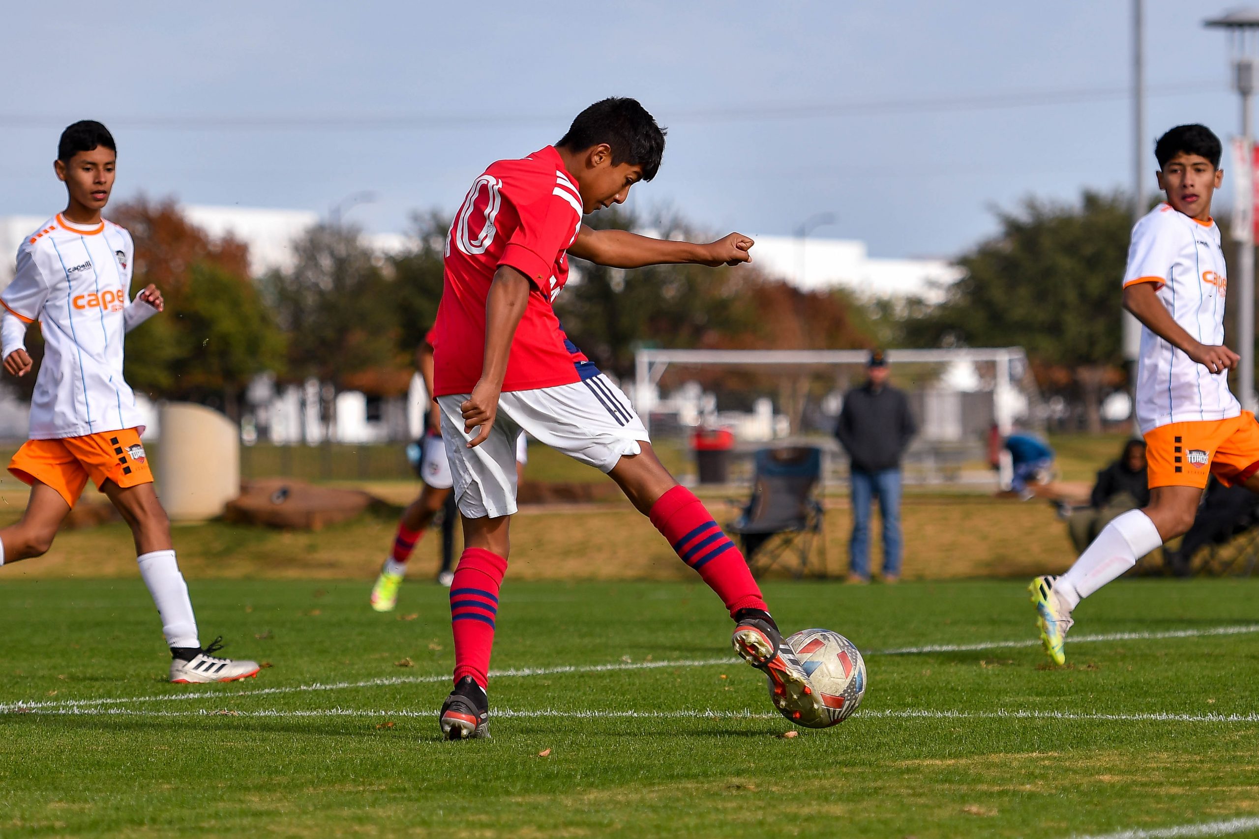 FC Dallas U15 midfielder (10) shoots in the MLS Next matchup against RGV FC.