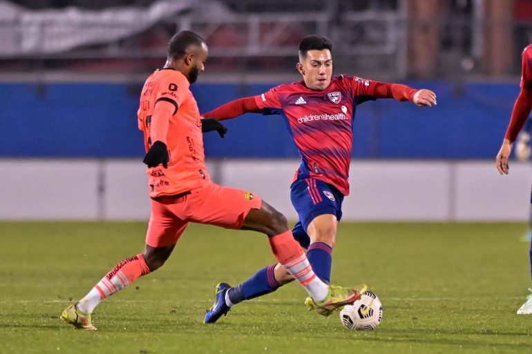 Alan Velasco attempts to dribble past a Barcelona SC defender, January 26. 2023. (Daniel McCullough, 3rd Degree)