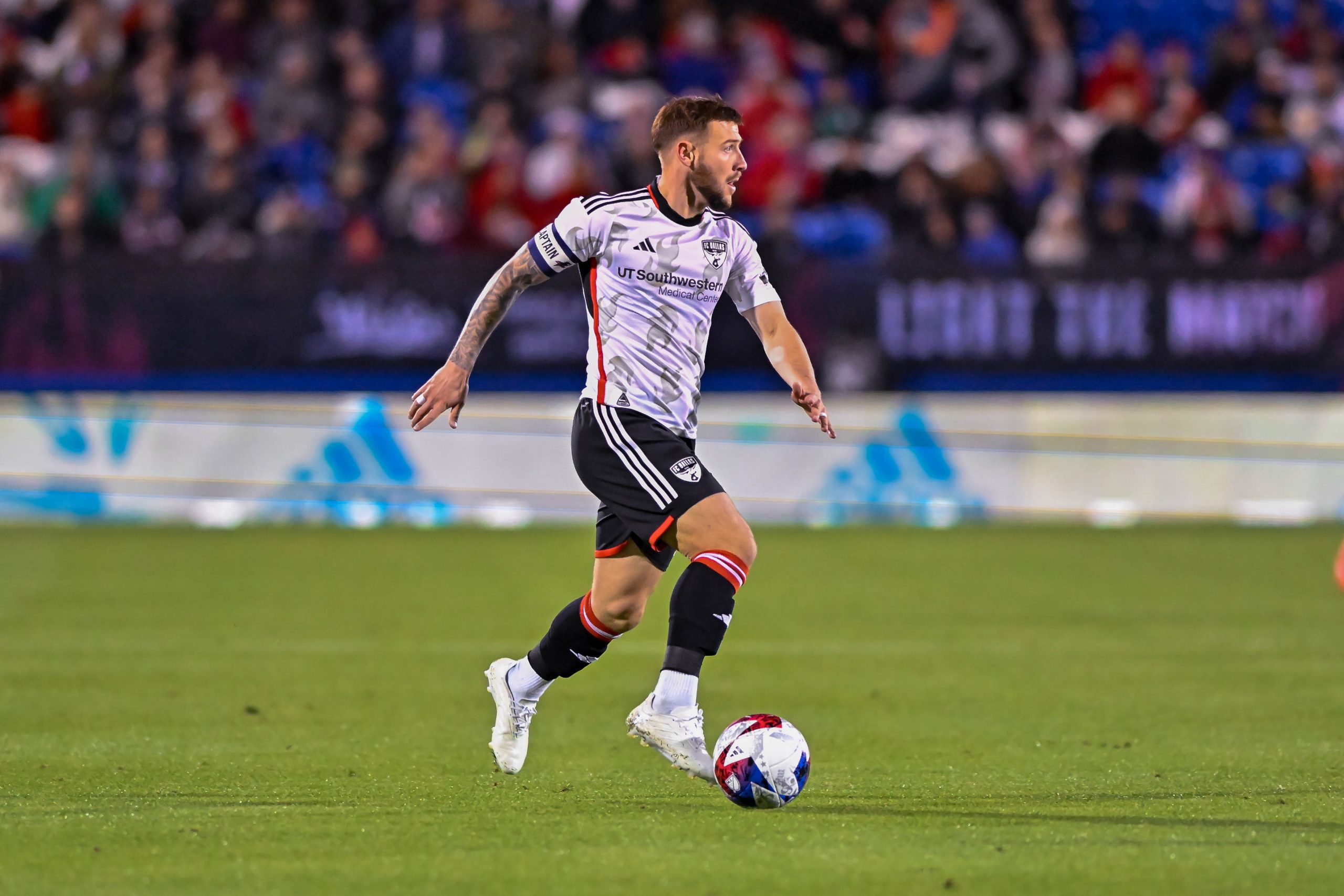 Paul Arriola scans the field in the MLS match against Sporting KC on Saturday, March 18, 2023, at Toyota Stadium. (Daniel McCullough, 3rd Degree)
