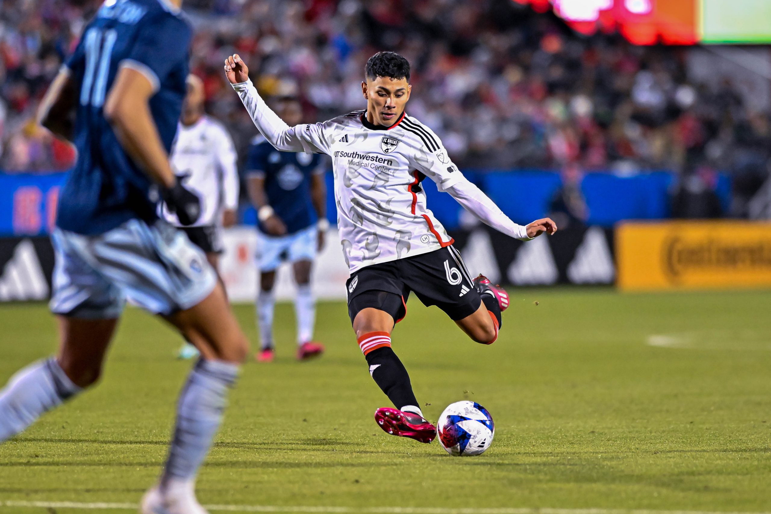 Edwin Cerrillo shoots in the MLS match against Sporting KC on Saturday, March 18, 2023, at Toyota Stadium. (Daniel McCullough, 3rd Degree)