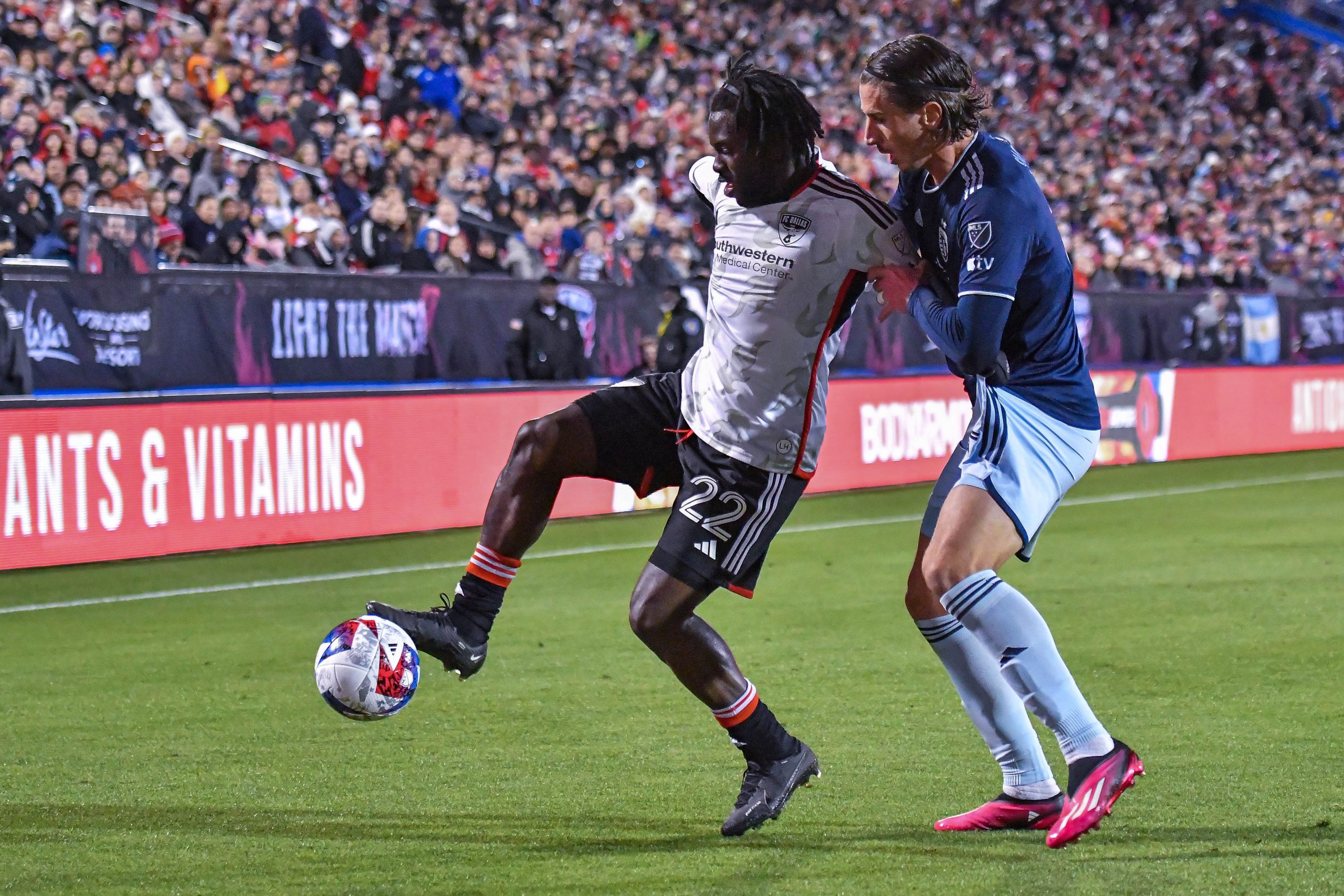 Sporting KC defender Ben Sweat stands up Ema Twumasi in the MLS match on Saturday, March 18, 2023, at Toyota Stadium. (Daniel McCullough, 3rd Degree)