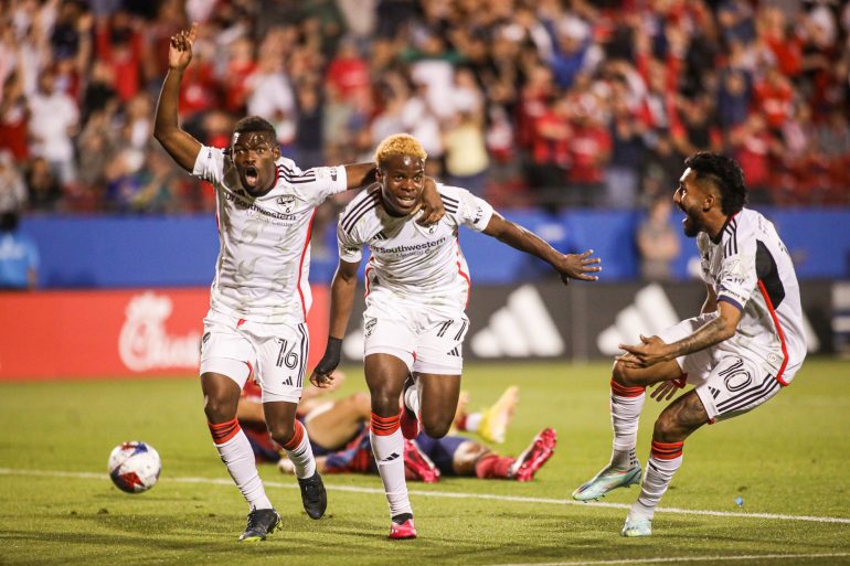 Tsiki Ntsabeleng, Bernard Kamungo, and Jesus Ferreira celebrate Kaumngo's game-winning goal against RSL, April 15, 2023. (Courtesy FC Dallas)