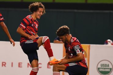 Anthony Ramirez has his boot cleaned by his captain Andre Costa after scoring two goals against LA Galaxy II, June 4,2023. (Courtesy North Texas SC)