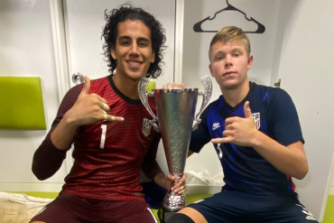 Antonio Carrera (left) and Nolan Norris pose with the Slovenia Nations Cup after the US U19s victory in 2022.