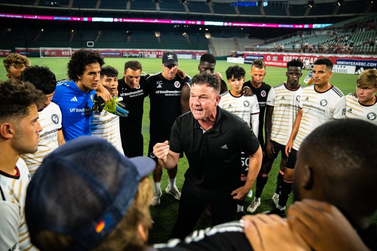 Interim Coach John Gall speaks to his team, 2023. (Courtesy North Texas SC)