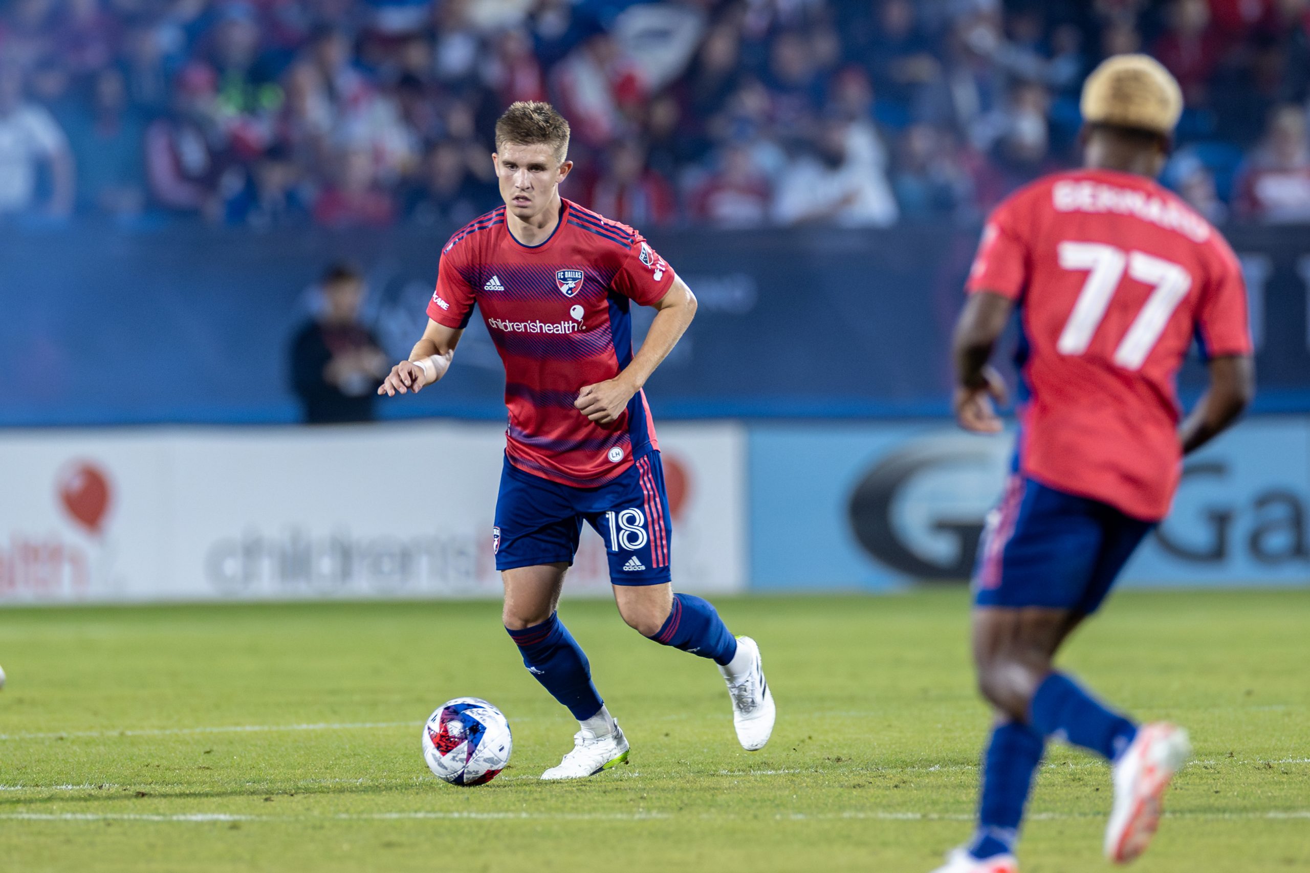 Liam Fraser looks to pass against Seattle Sounders during the 2023 MLS Cup Playoffs First Round, Game Two, at Toyota Stadium, November 4, 2023. (Matt Visinsky, 3rd Degree)