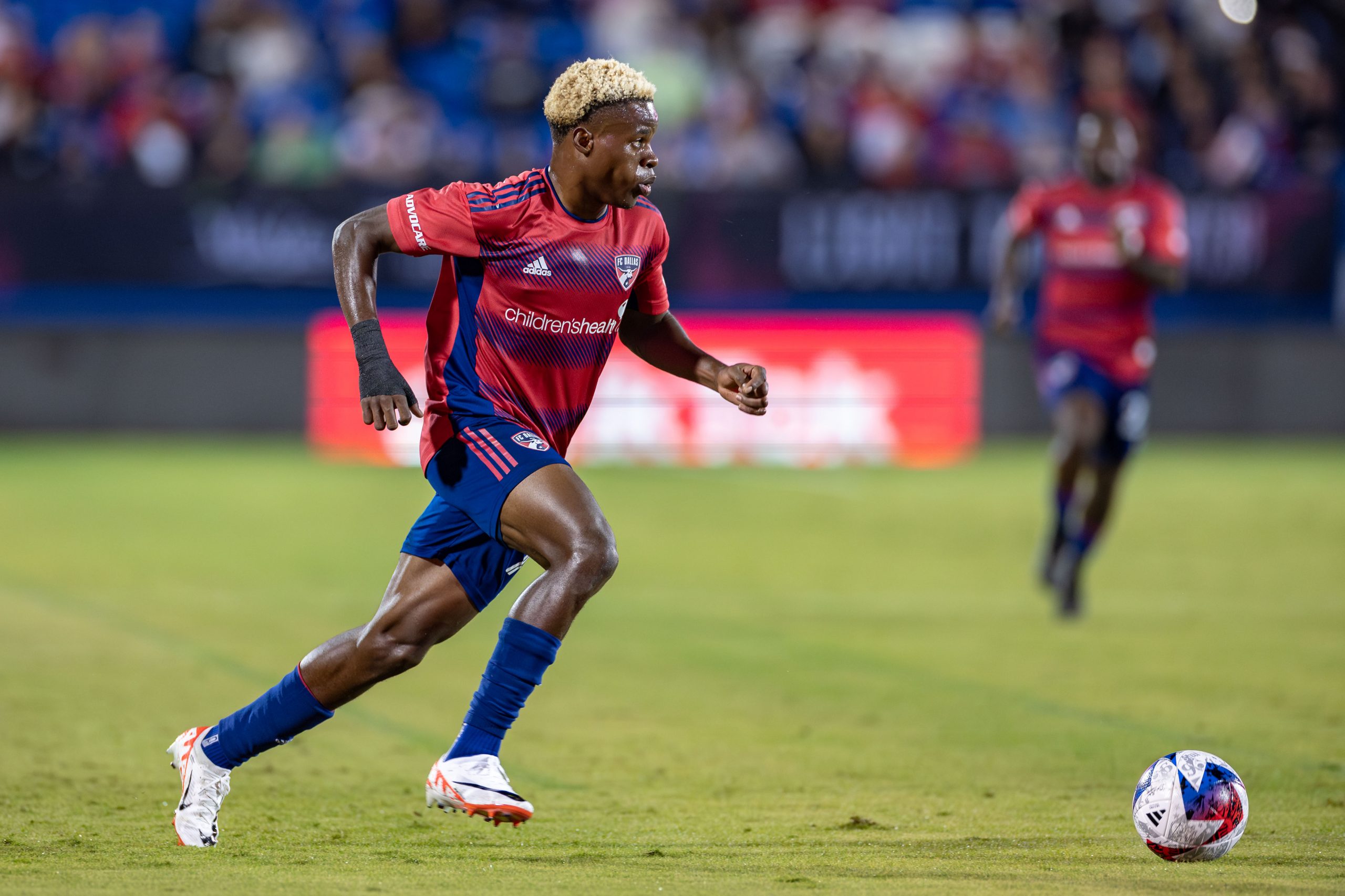 Bernard Kamungo charges up field against Seattle Sounders during the 2023 MLS Cup Playoffs First Round, Game Two, at Toyota Stadium, November 4, 2023. (Matt Visinsky, 3rd Degree)