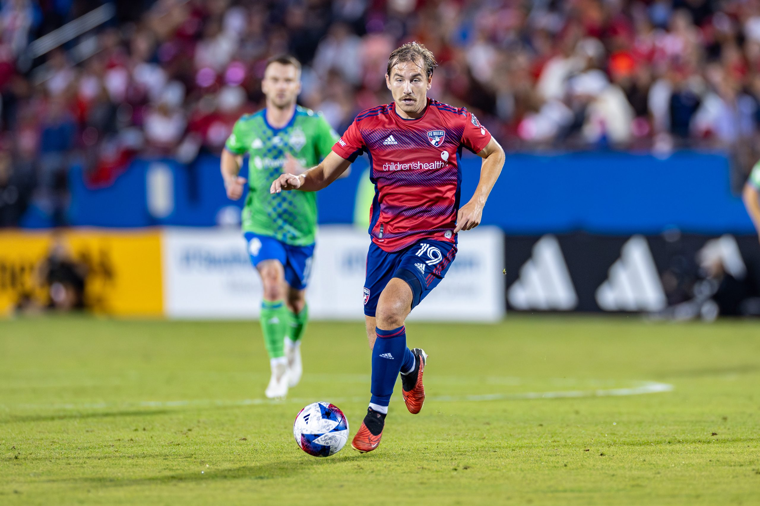 Paxton Pomykal drives upfield against Seattle Sounders during the 2023 MLS Cup Playoffs First Round, Game Two, at Toyota Stadium, November 4, 2023. (Matt Visinsky, 3rd Degree)