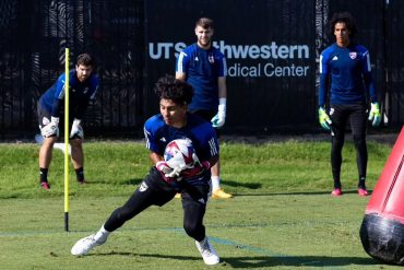 Nico Montoya makes a save in FC Dallas first team training while Jimmy Maurer, Maarten Paes, and Antonio Carrera look on. (Courtesy FC Dallas)