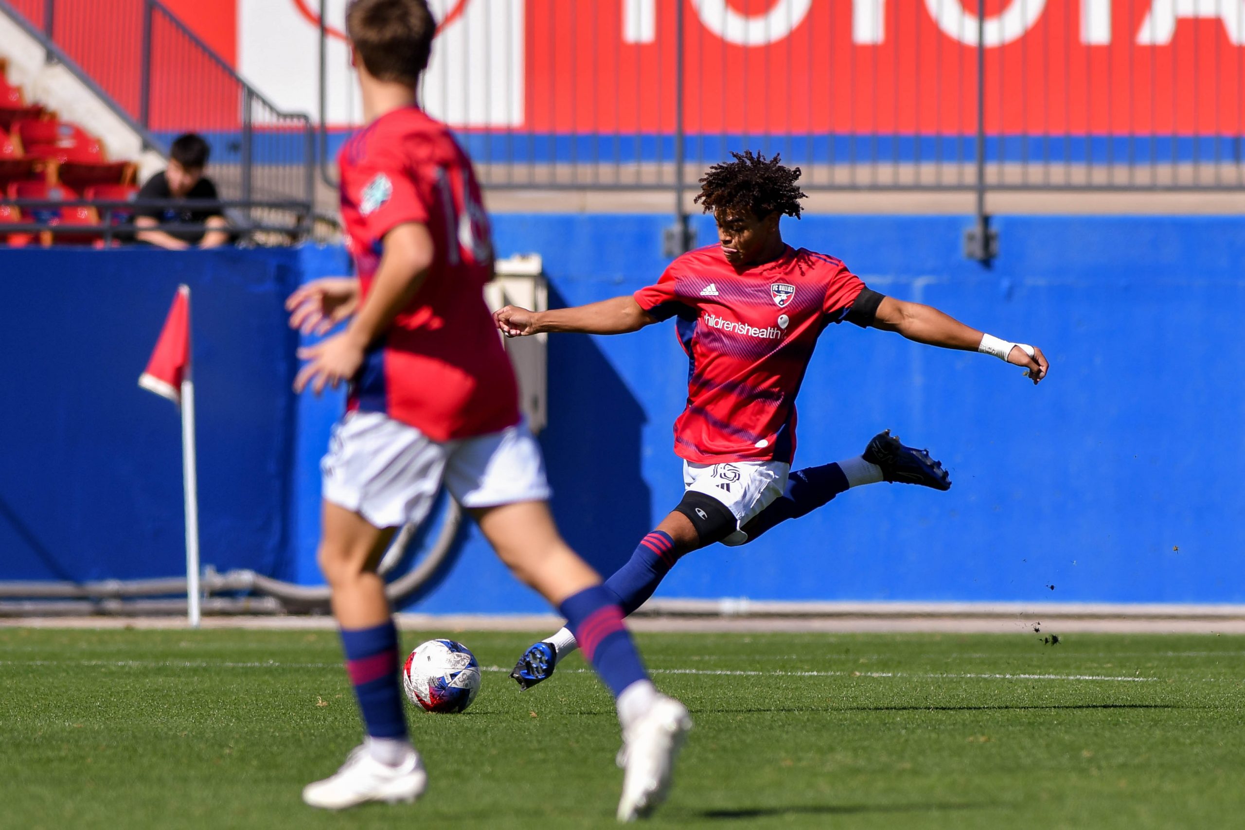 FC Dallas U17 defender Ian Charles (15) sends a long pass up field in the MLS Next match against Austin FC at Toyota Stadium on Sunday, February 4, 2024. (Daniel McCullough / 3rd Degree)