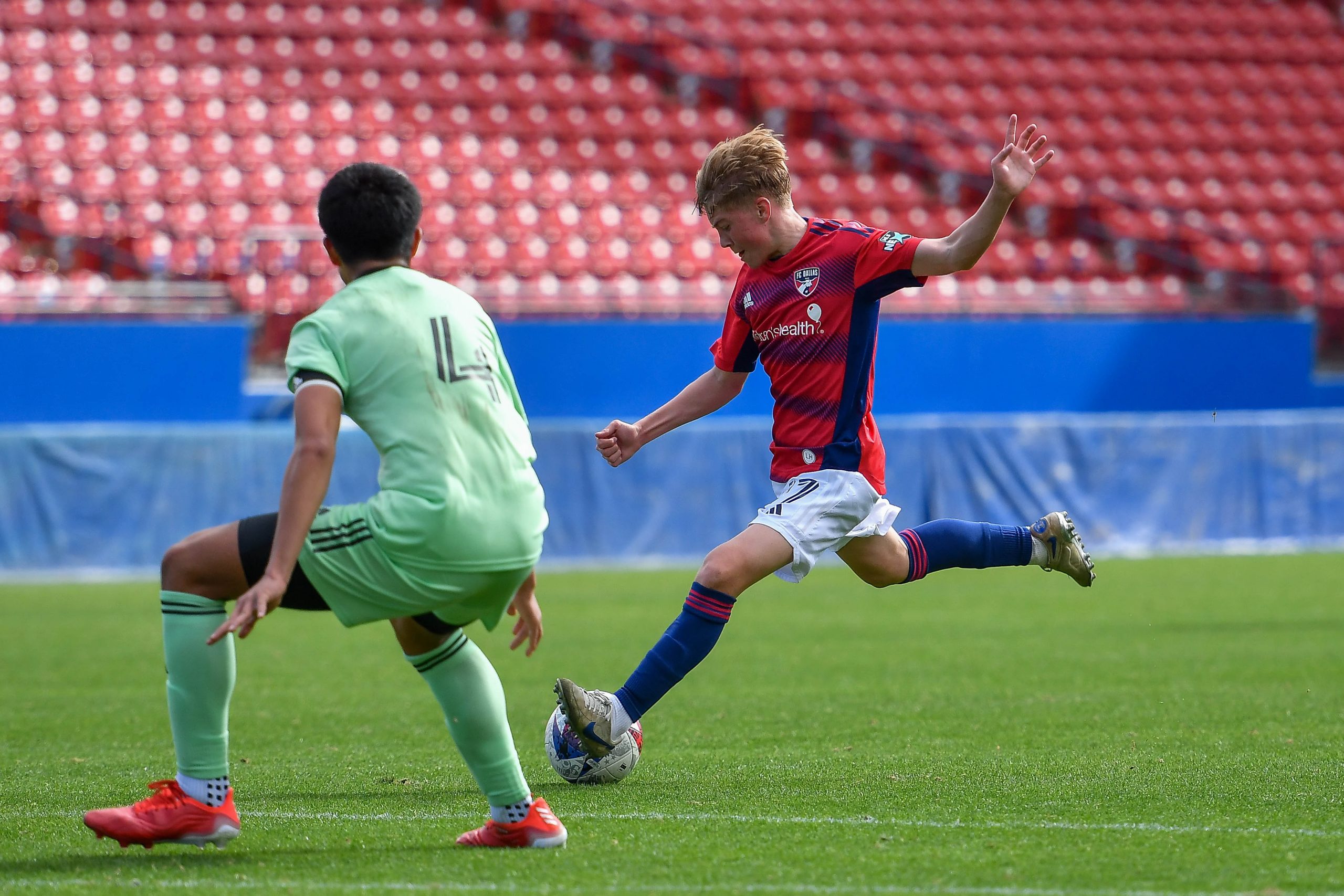 FC Dallas U17 midfielder Bryce Outman (17) shoots in the MLS Next match against Austin FC at Toyota Stadium on Sunday, February 4, 2024. (Daniel McCullough / 3rd Degree)