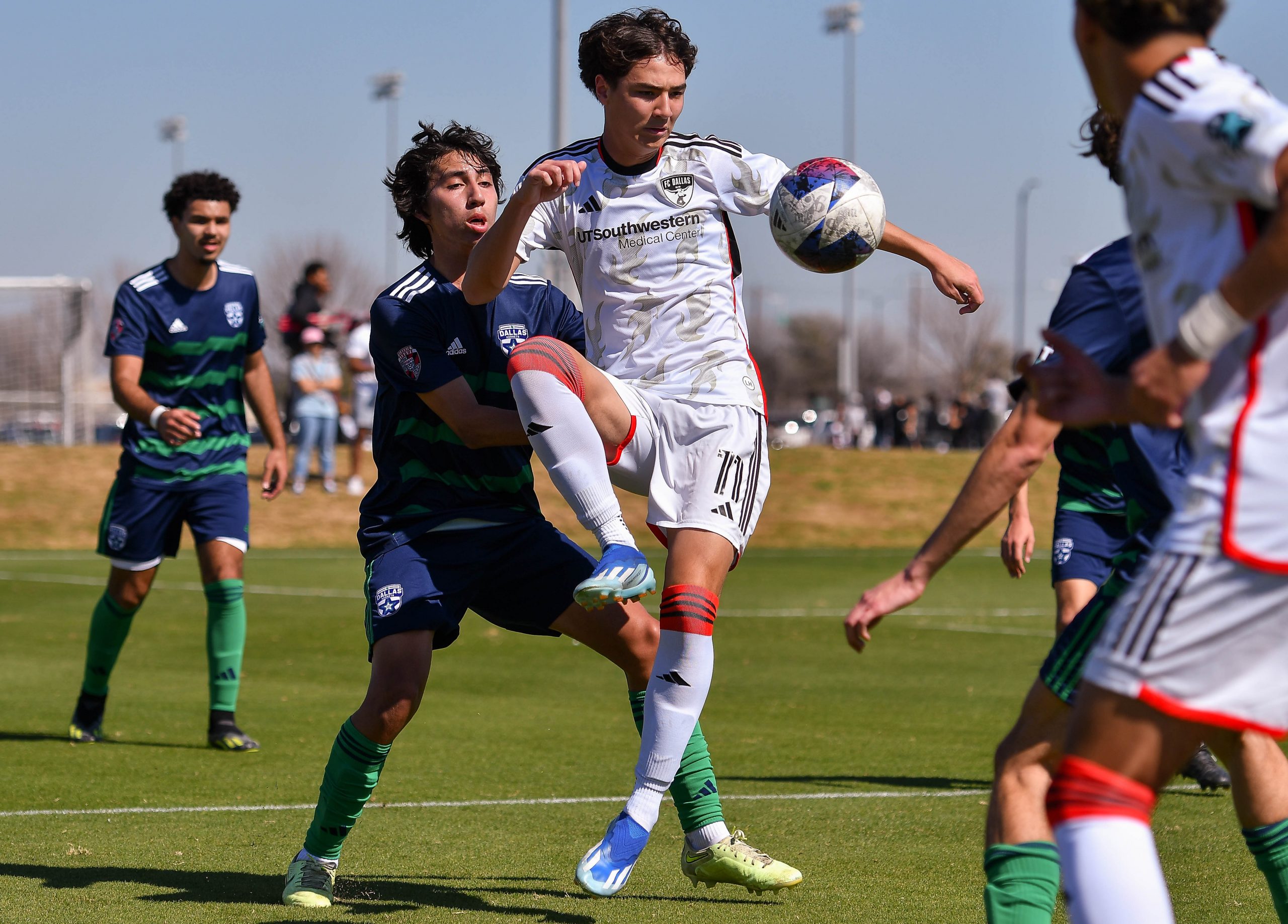 FC Dallas U17 forward Ren Sylvester (11) receives the ball under pressure in the MLS Next match against Dallas Hornets on Saturday, March 2, 2024 at Toyota Soccer Center. (Daniel McCullough, 3rd Degree)