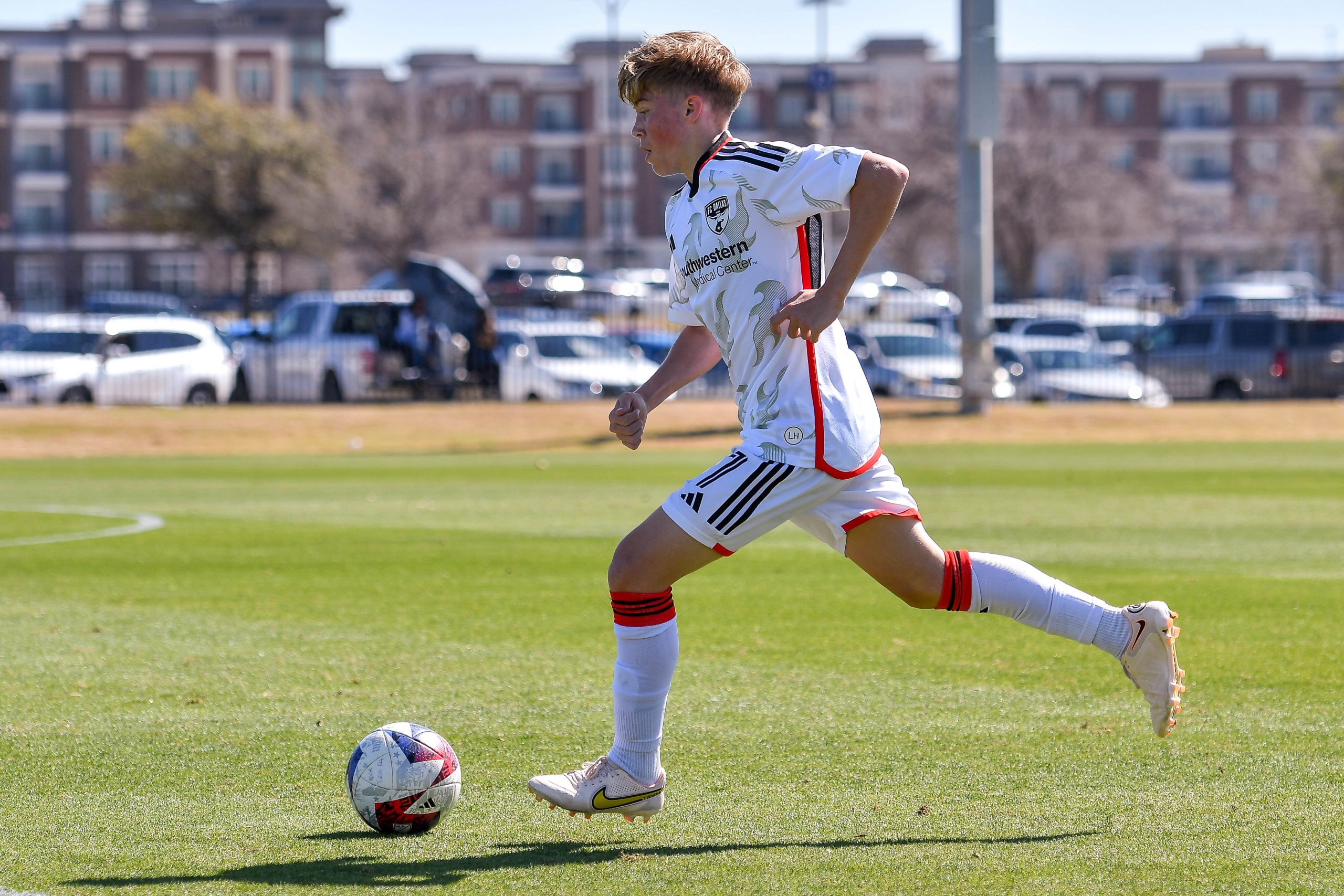 FC Dallas U17 midfielder Bryce Outman (17) dribbles across midfield in the MLS Next match against Dallas Hornets on Saturday, March 2, 2024 at Toyota Soccer Center. (Daniel McCullough, 3rd Degree)