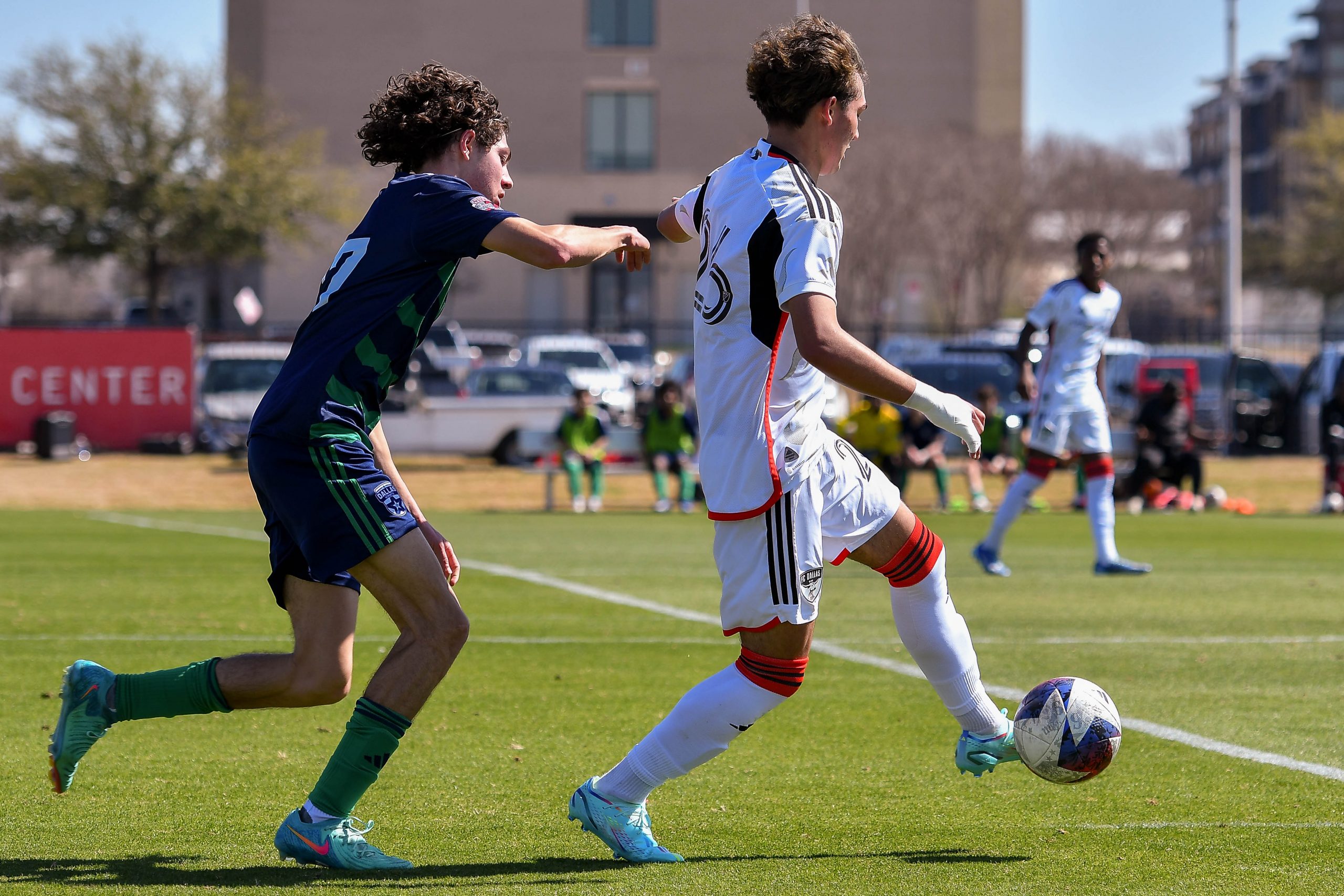 FC Dallas U17 defender Jonathan Dozier (26) dribbles away from the defender in the MLS Next match against Dallas Hornets on Saturday, March 2, 2024 at Toyota Soccer Center. (Daniel McCullough, 3rd Degree)