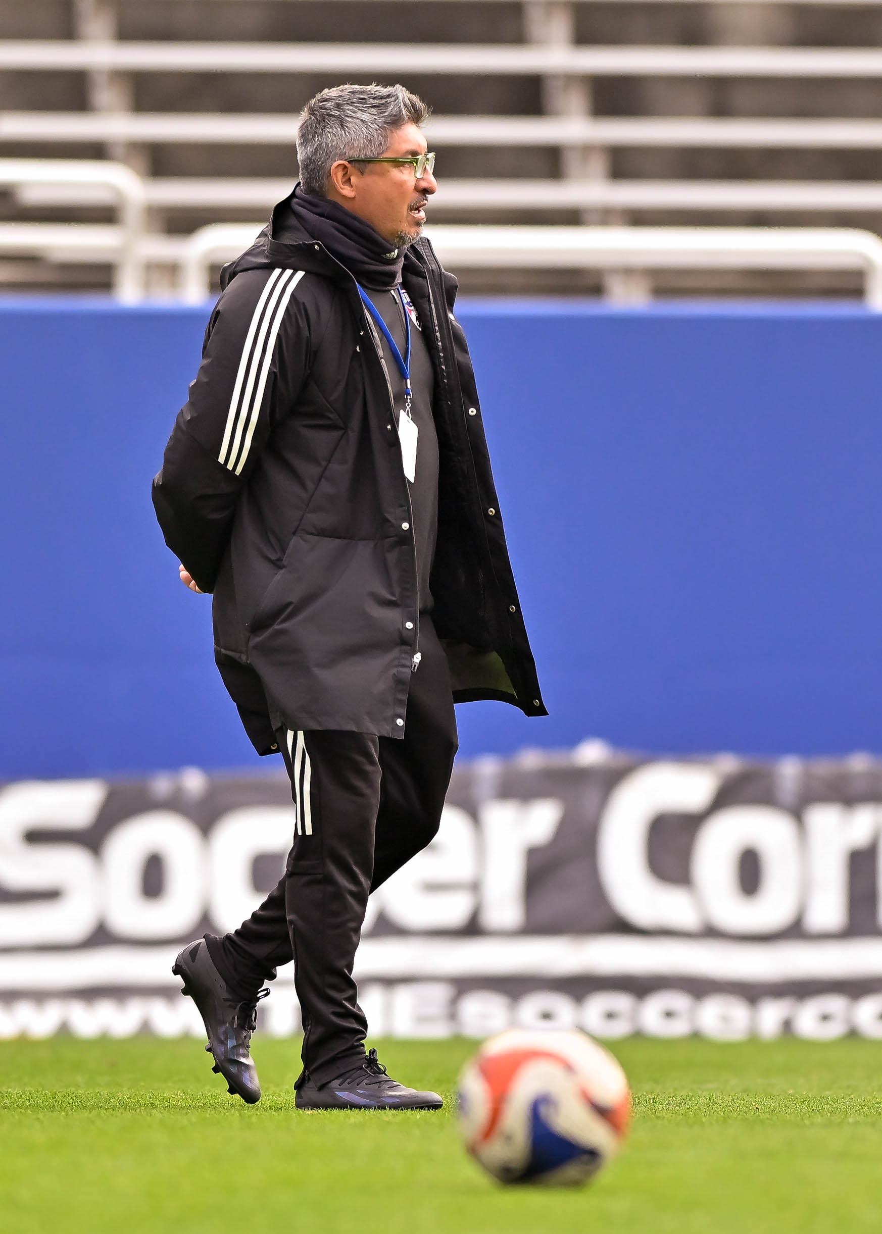 FC Dallas U19 coach Victor Medina watches warmups before the Dallas Cup match against Tigers UANL at the Cotton Bowl on Sunday, March 24,2024. (Daniel McCullough, 3rd Degree)