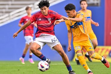 FC Dallas U19 midfielder Rey Marquez dribbles away from the defender in the Dallas Cup match against Tigers UANL at the Cotton Bowl on Sunday, March 24,2024. (Daniel McCullough, 3rd Degree)