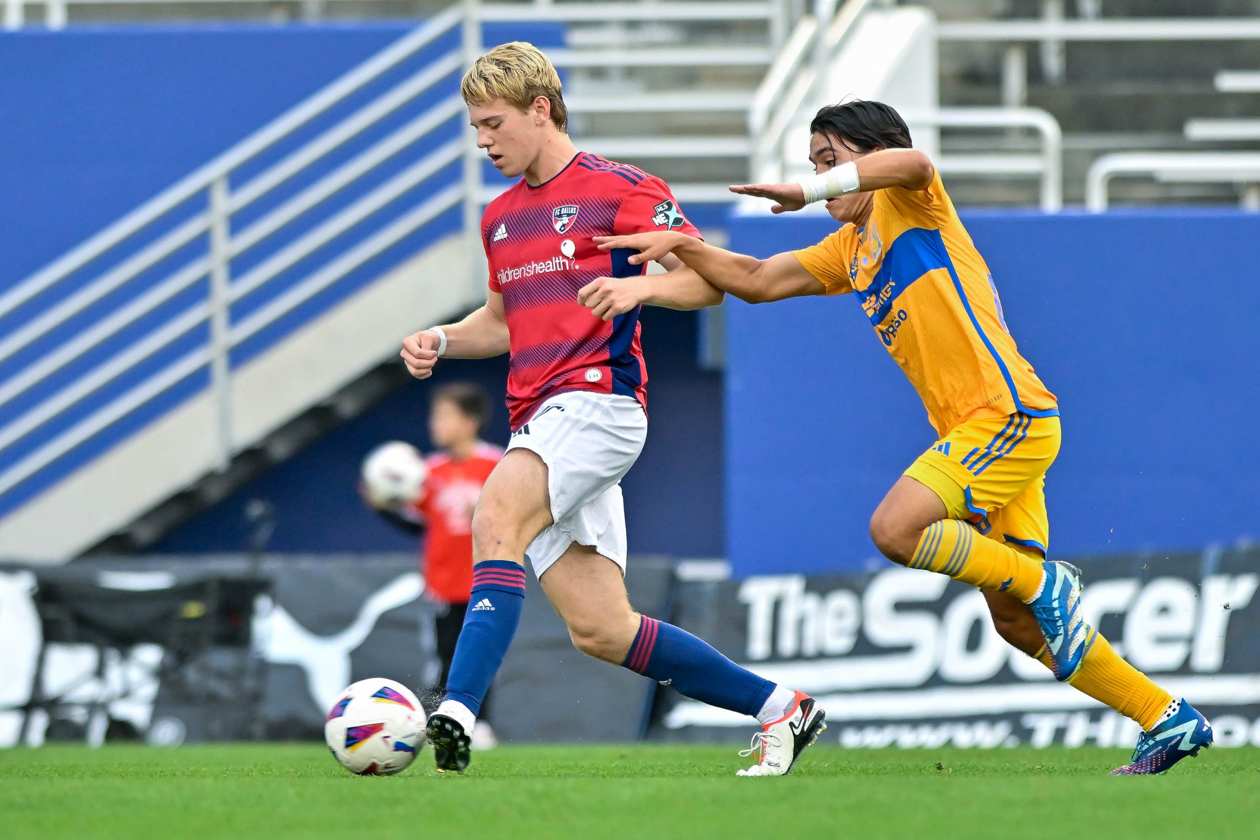 FC Dallas U19 defender Aiden Bazzell passes back to the goalie in the Dallas Cup match against Tigers UANL at the Cotton Bowl on Sunday, March 24,2024. (Daniel McCullough, 3rd Degree)