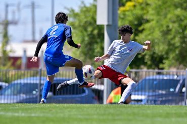 FC Dallas U17 ECNL White midfielder Santi Olmedo competes for the loose ball in the Dallas Cup match against Doral SC at Toyota Soccer Center on March 26, 2024. (Daniel McCullough, 3rd Degree)