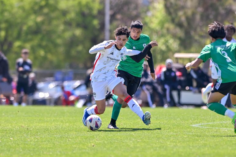 FC Dallas U16 defender Ougir Vega dribbles away from trouble in the Dallas Cup match against Celtic RL at Toyota Soccer Center on Tuesday, March 26, 2024. (Daniel McCullough, 3rd Degree)