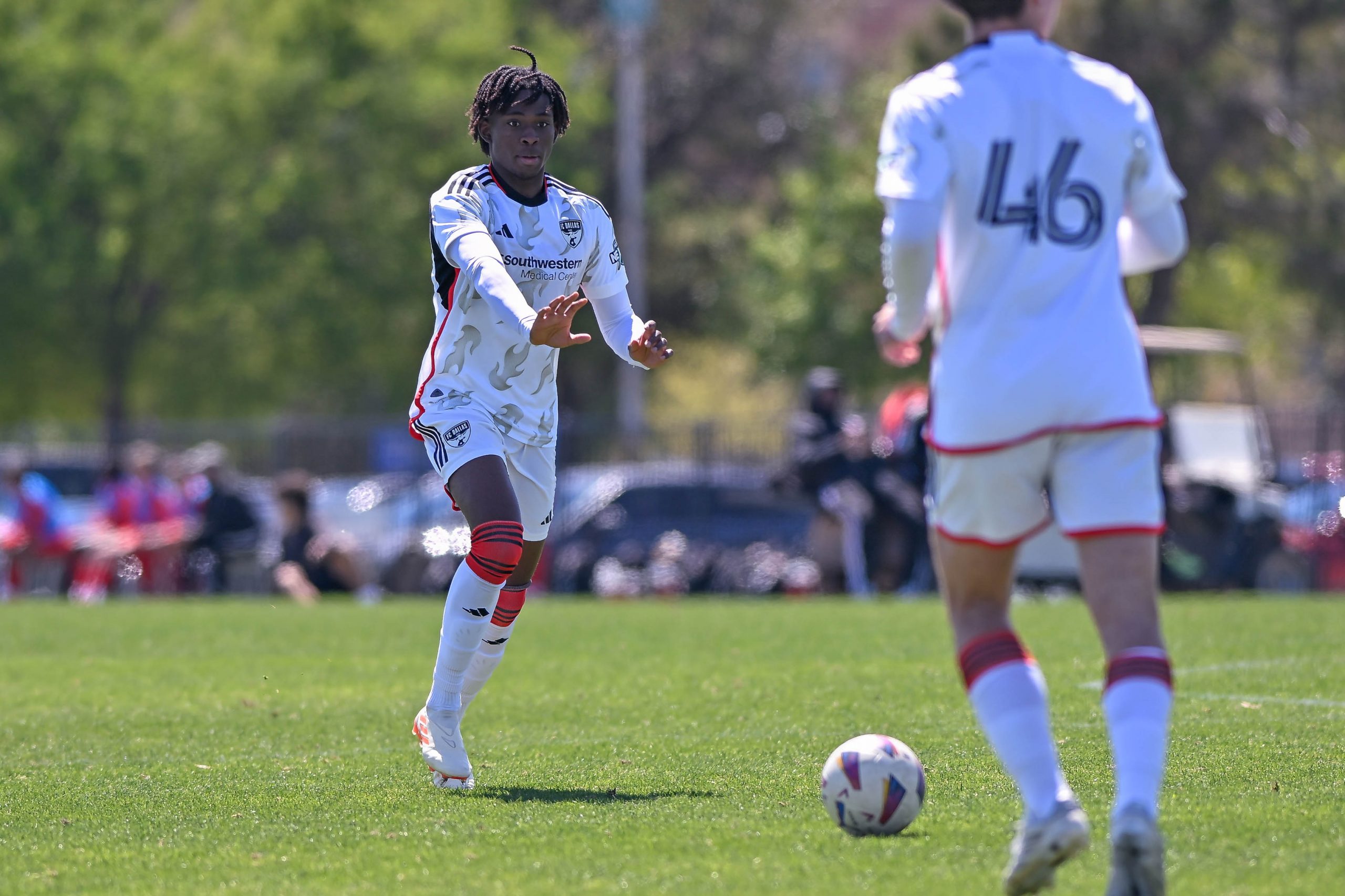 FC Dallas U16 defender Zach Molomo waves off his teammate in the Dallas Cup match against Celtic RL at Toyota Soccer Center on Tuesday, March 26, 2024. (Daniel McCullough, 3rd Degree)