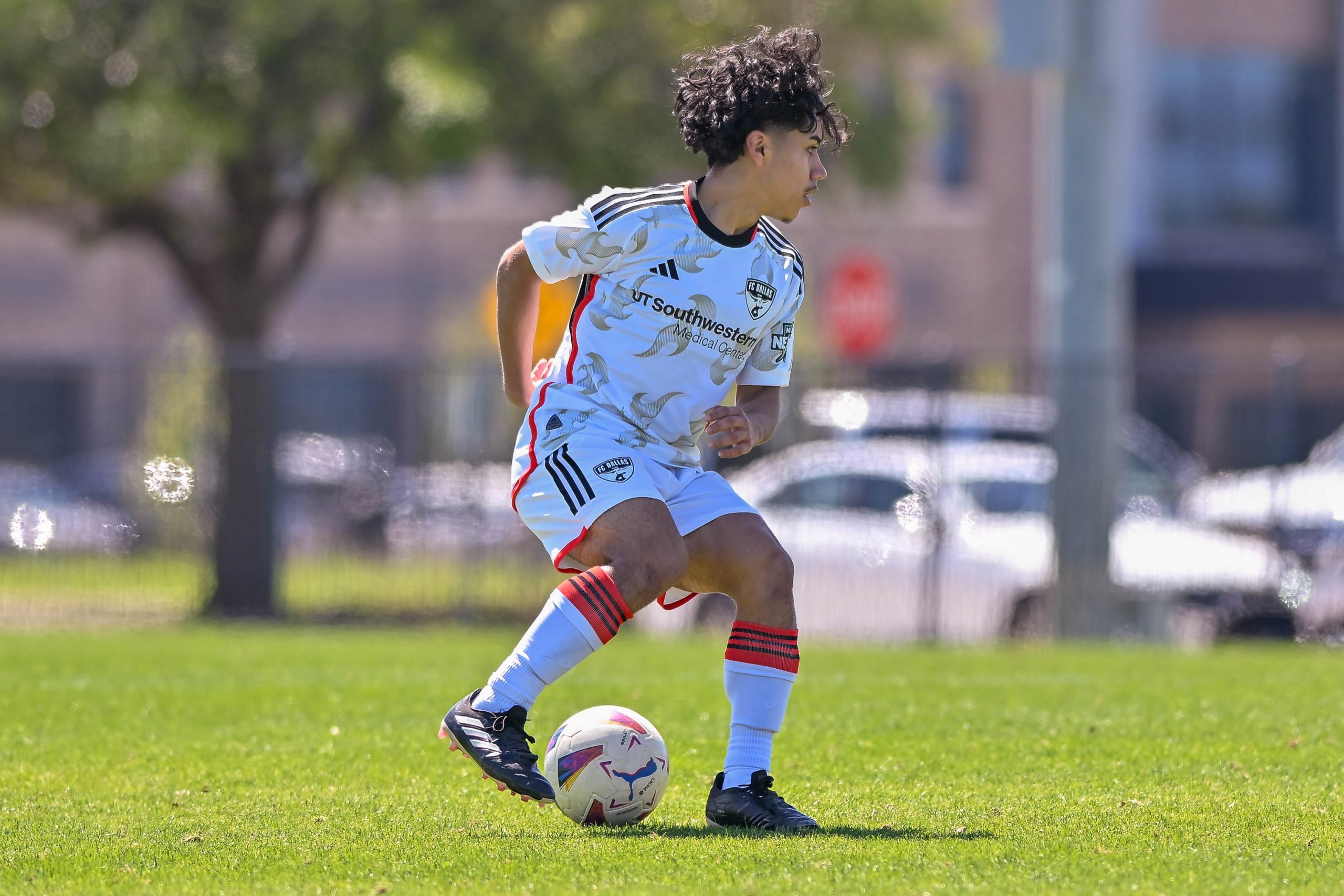 FC Dallas U16 midfielder Andre Saucedo cuts back in the Dallas Cup match against Celtic RL at Toyota Soccer Center on Tuesday, March 26, 2024. (Daniel McCullough, 3rd Degree)