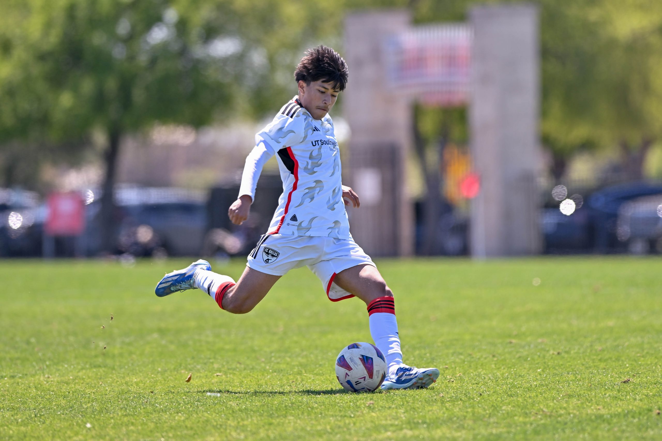 FC Dallas U16 defender Edgar Razo sends a cross into the box in the Dallas Cup match against Celtic RL at Toyota Soccer Center on Tuesday, March 26, 2024. (Daniel McCullough, 3rd Degree)