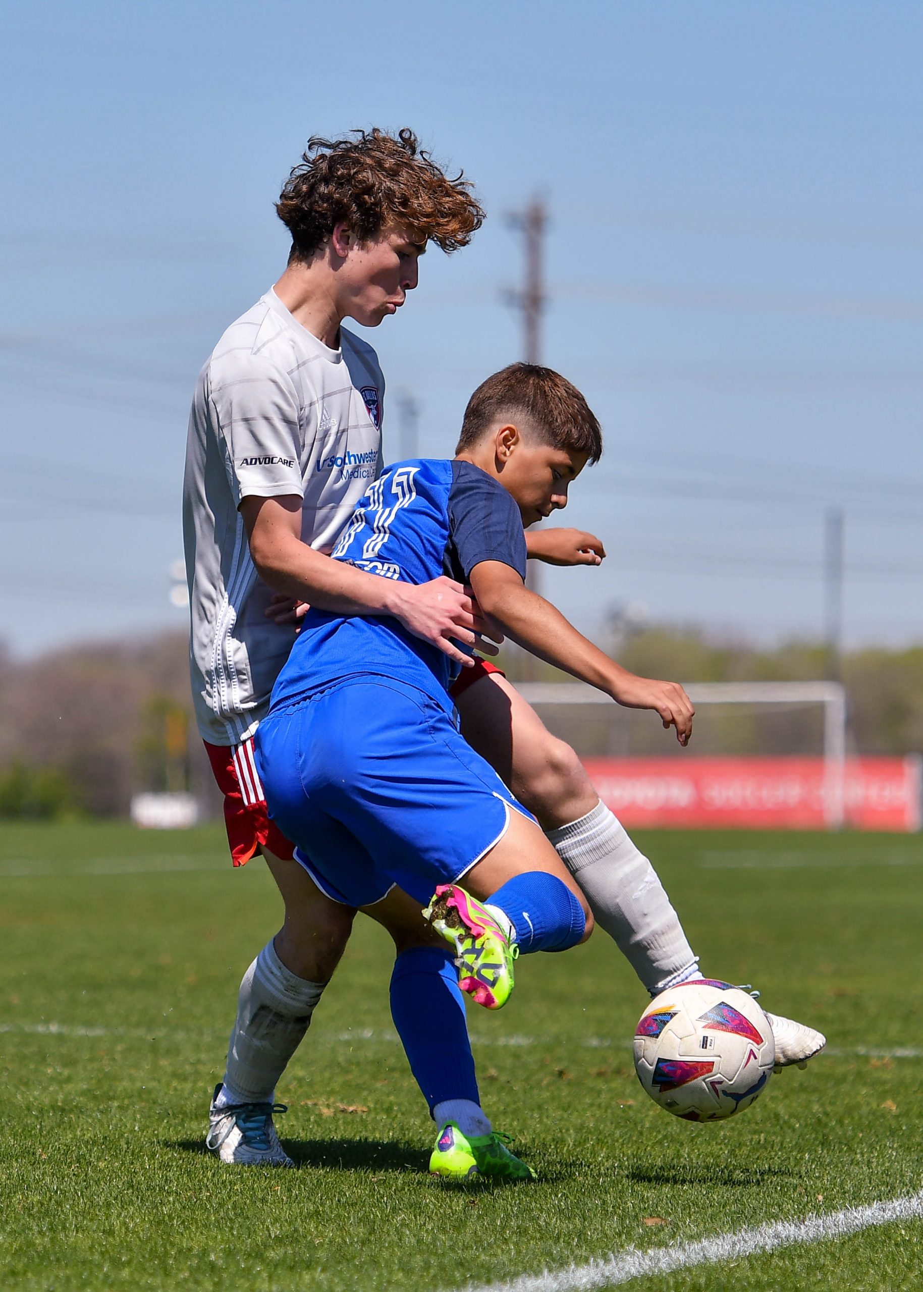 FC Dallas U17 ECNL White defender Jace Brewer pokes the ball loose in the Dallas Cup match against Doral SC at Toyota Soccer Center on March 26, 2024. (Daniel McCullough, 3rd Degree)