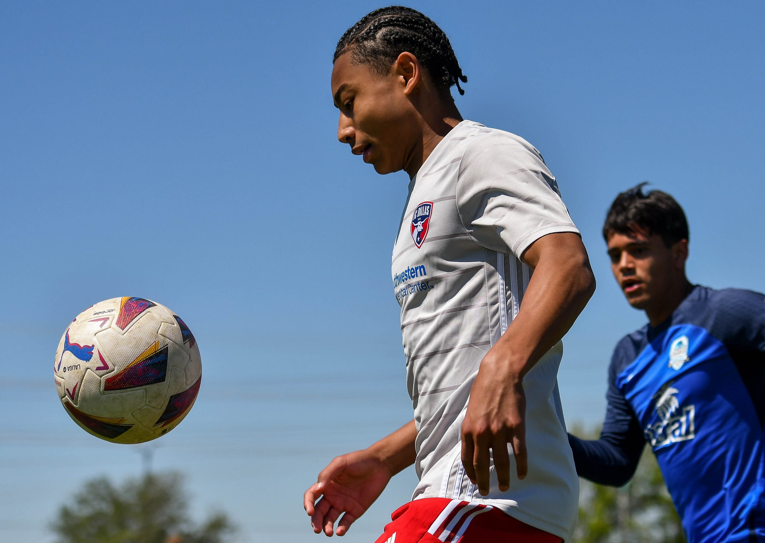FC Dallas U17 ECNL White forward Quincy Carter chases the ball down the sideline in the Dallas Cup match against Doral SC at Toyota Soccer Center on March 26, 2024. (Daniel McCullough, 3rd Degree)
