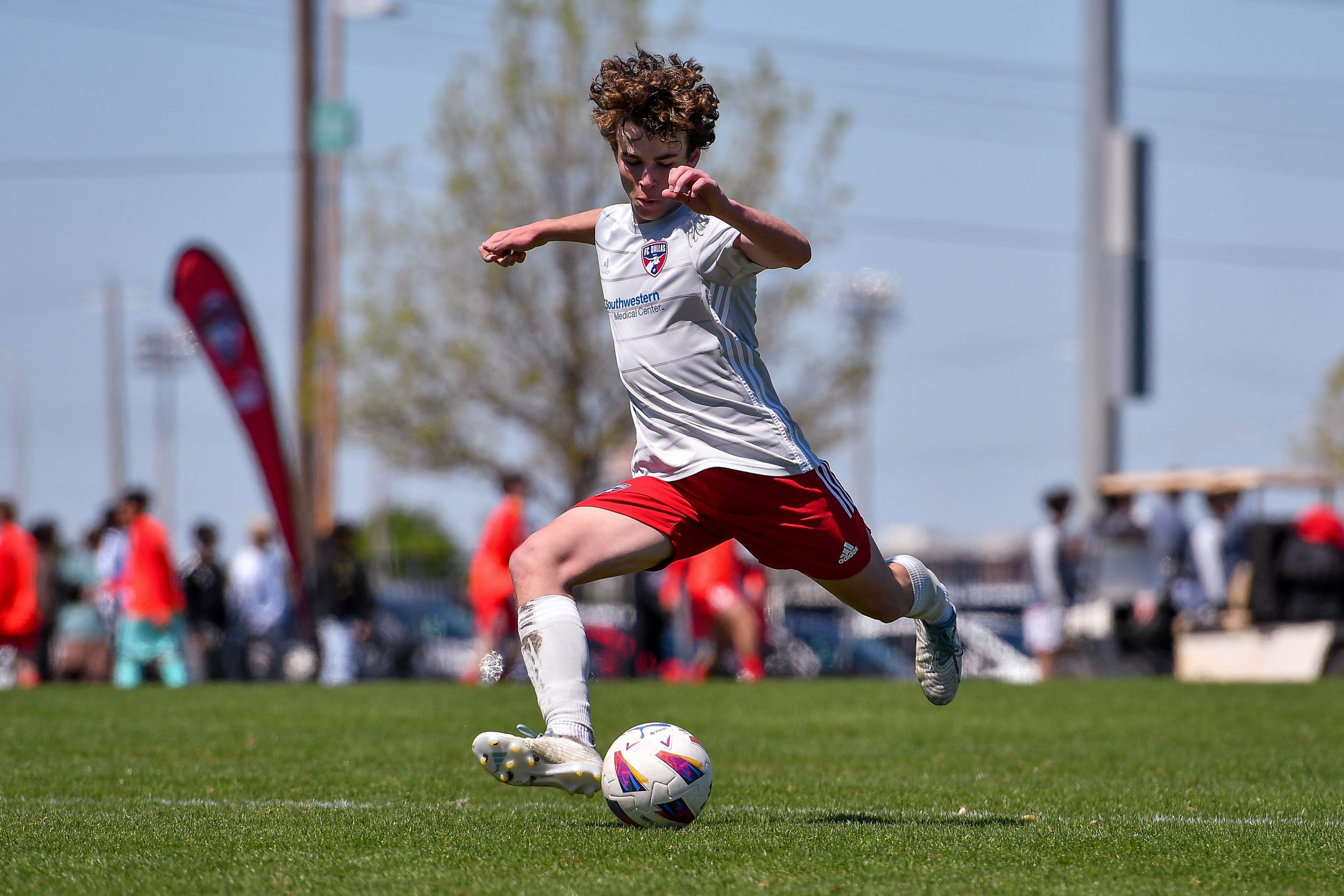 FC Dallas U17 ECNL White defender Jace Brewer sends a long ball down field  in the Dallas Cup match against Doral SC at Toyota Soccer Center on March 26, 2024. (Daniel McCullough, 3rd Degree)