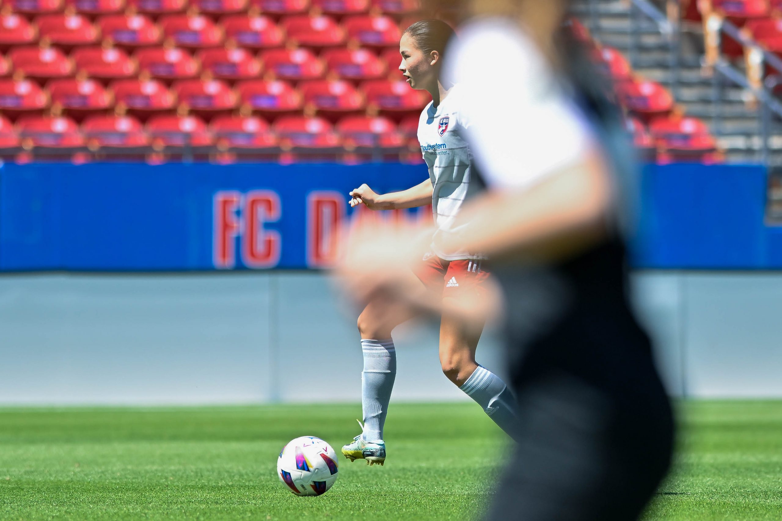 FC Dallas midfielder Kiara Gilmore scans the field while receiving the ball in the Dallas Cup U17 Final against Eintracht Frankfurt at Toyota Stadium on Saturday, March 29, 2024. (Daniel McCullough, 3rd Degree)