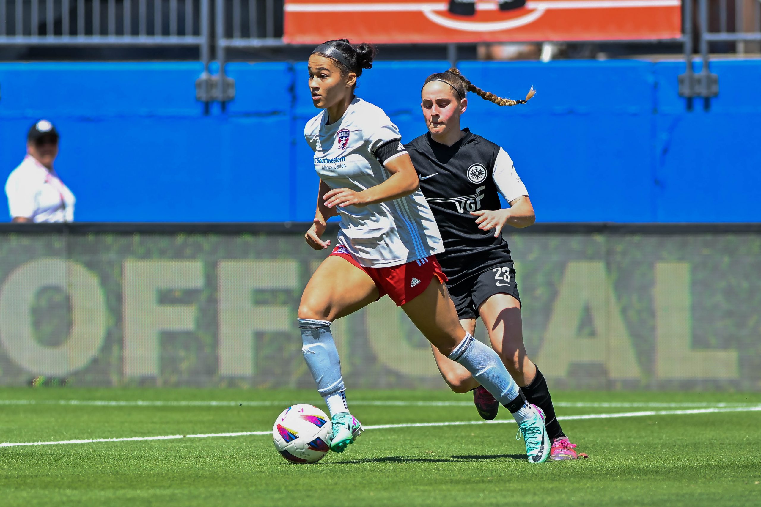 FC Dallas ECNL defender Trinity Armstrong (33) dribbles out of the back in the Dallas Cup U17 Final against Eintracht Frankfurt at Toyota Stadium on Saturday, March 29, 2024. (Daniel McCullough, 3rd Degree)