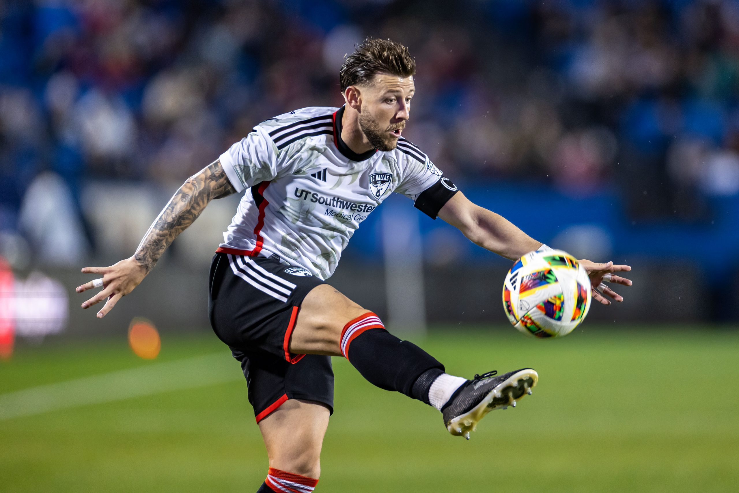 Paul Arriola attempts to control the ball against the Vancouver Whitecaps at Toyota Stadium, March 16, 2024. (Matt Visinsky, 3rd Degree)