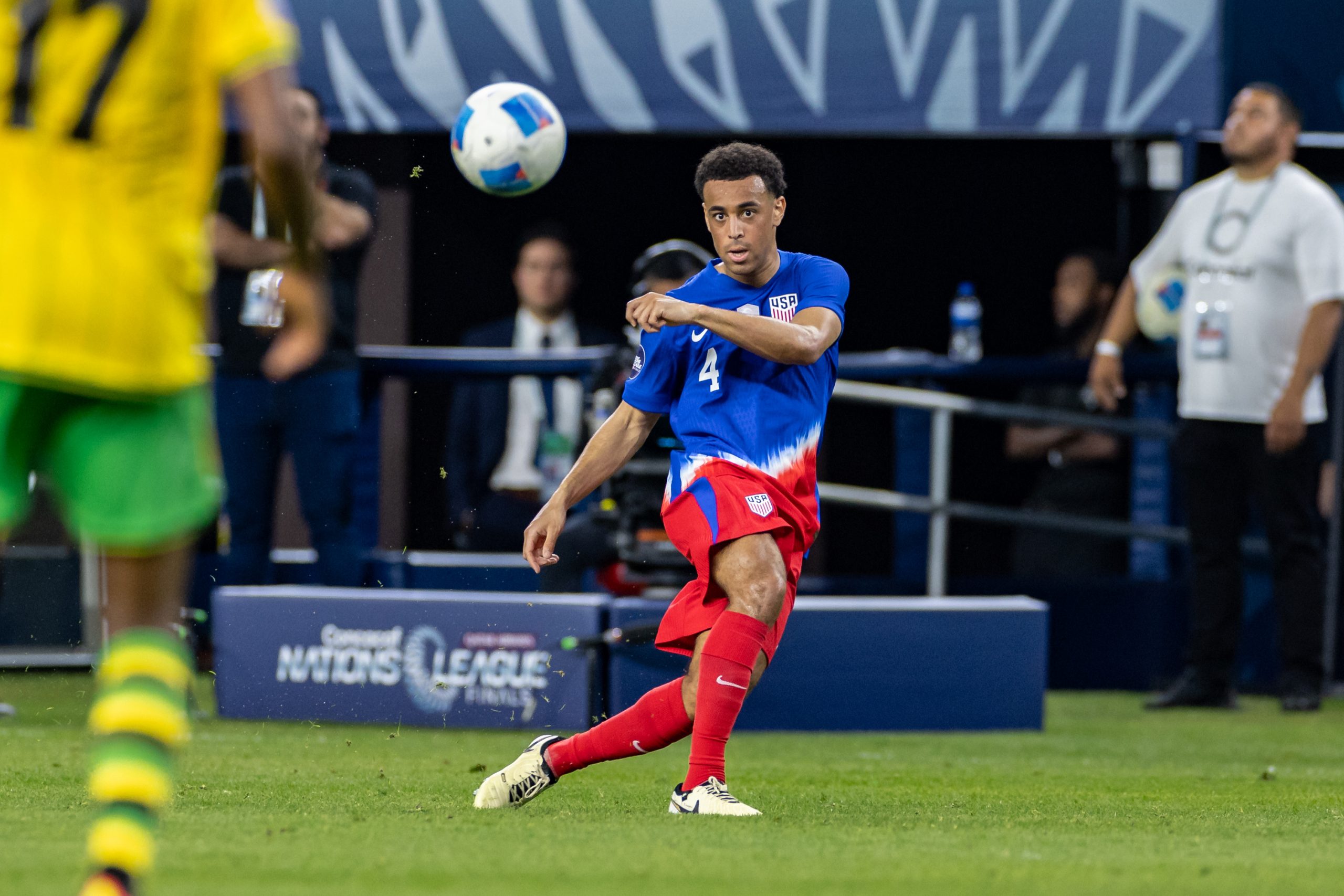 Tyler Adams hits a long pass as the US Men's National team knocks off Jamaica 3-1 in the Concacaf Nations League on March 21, 2024, at AT&T Stadium in Arlington, Texas. (Matt Visinsky, 3rd Degree)