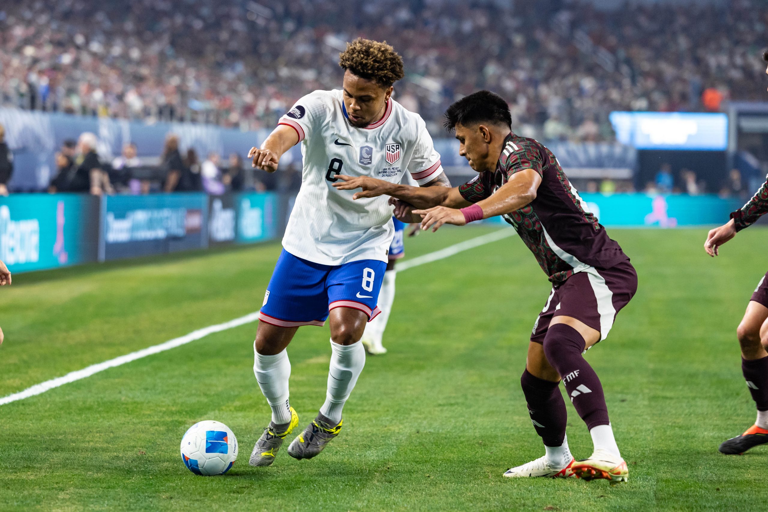 Weston McKinnie holds off a defender in the USA's 2-0 Nations League Final win over Mexico, March 24, 2024. (Matt Visinsky, 3rd Degree)