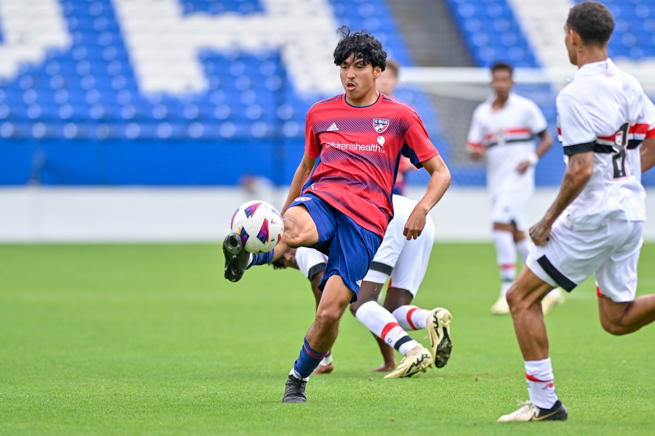 FC Dallas U19 midfielder Rey Marquez clears the ball in the Dallas Cup Super Group Final against São Paulo FC at Toyota Stadium on Sunday, March 31, 2024. (Daniel McCullough, 3rd Degree)
