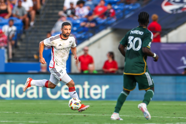 Sebastian Lletget dribbled upfield and looks for a crack in the Portland Timbers defense in the FCD 3-2 win on July 4, 2024. (Courtesy FC Dallas)