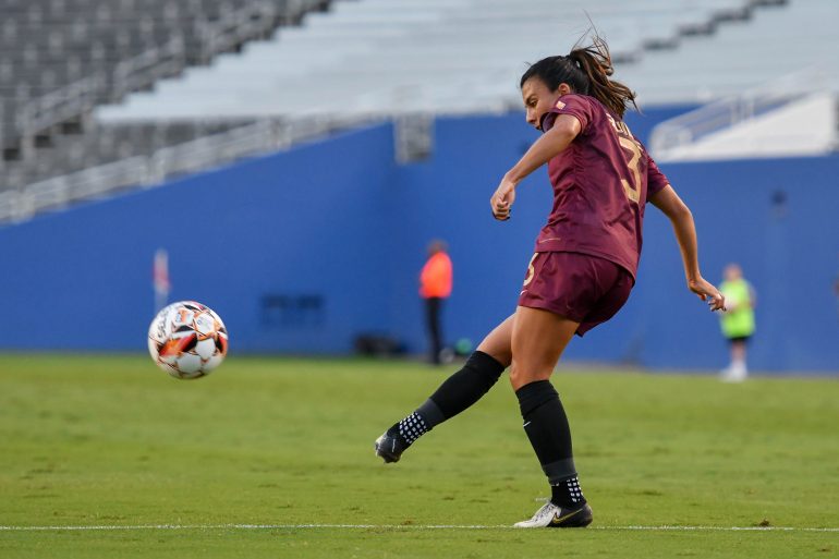 Dallas Trinity FC defender Gaby Guillén (3) sends the ball into the box in the USL Super League match against DC Power FC at the Cotton Bowl on Saturday, September 7, 2024. (Daniel McCullough, 3rd Degree)