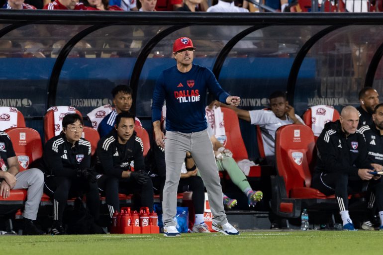 Eric Quill and his red hat coach against Sporting KC, March 29, 2025. (Matt Visinsky, 3rd Degree)