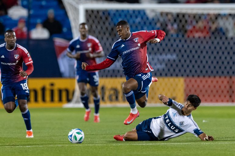 Patrickson Delgado hurdles the Vancouver Whitecaps, March 15, 2025. (Matt Visinsky, 3rd Degree)
