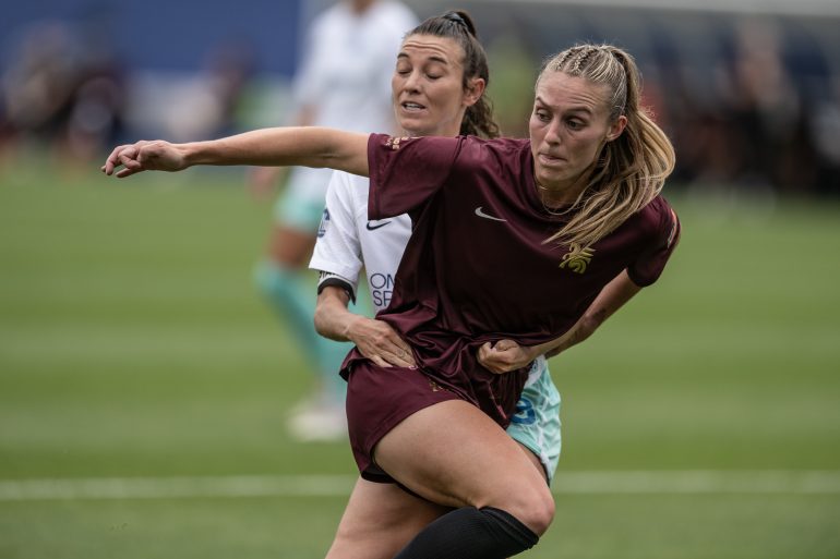 Allie Thornton fights off a defender in the Dallas Trinity FC game against Fort Lauderdale United FC, April 19, 2025. (Courtesy Mike Brooks)