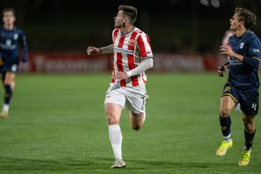 Brandon McManus of Texoma FC looks for the ball against FC Naples, April 5, 2025. (Copyright Mike Brooks)