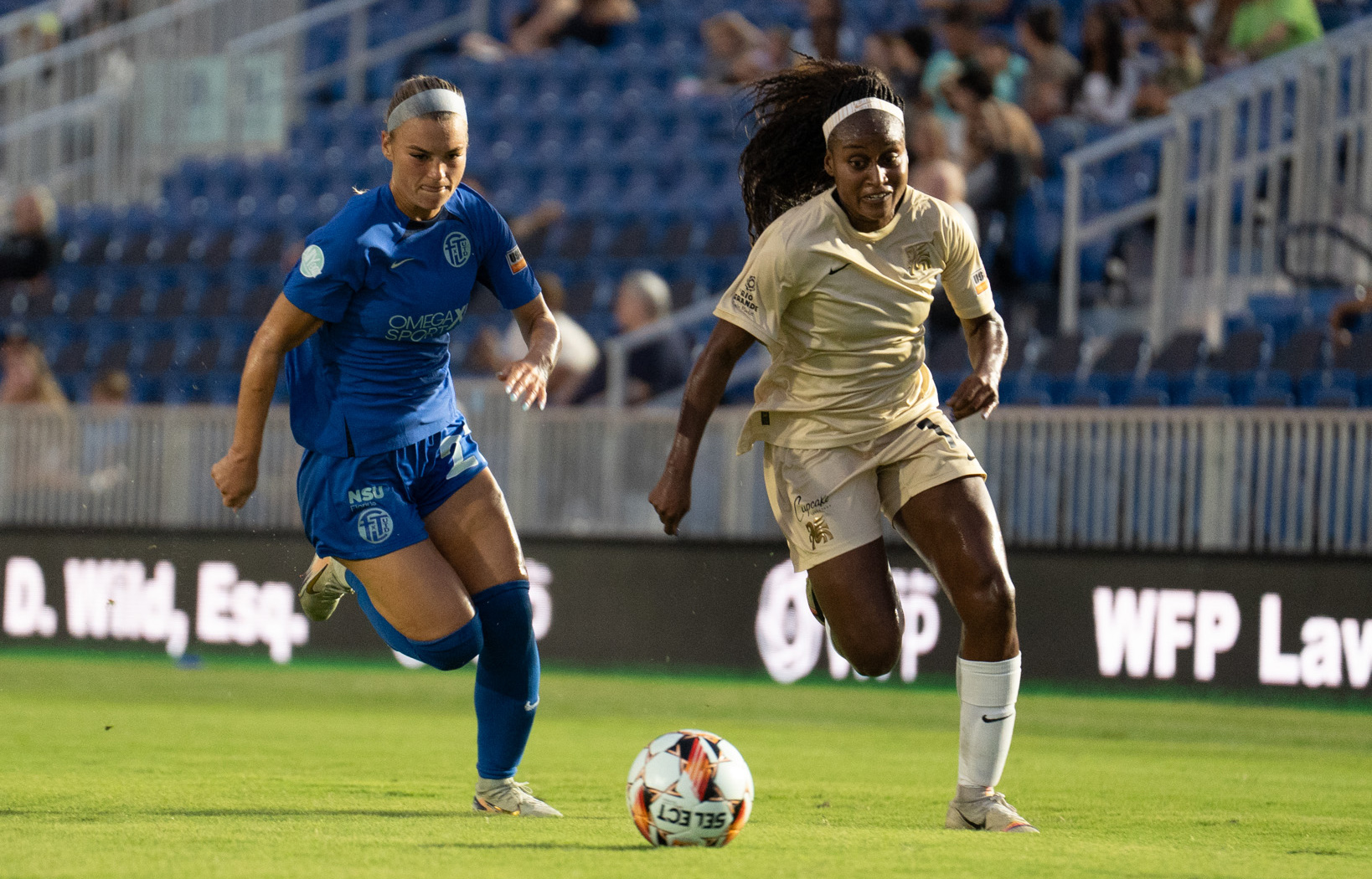 Chioma Ubogagu (right) charges upfield against Fort Lauderdale. (Courtesy Dallas Trinity FC)