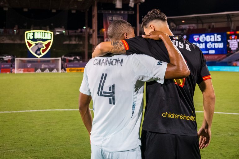 Reggie Cannon and Peta Musa share a moment. Sept 20, 2025. (Courtesy FC Dallas)