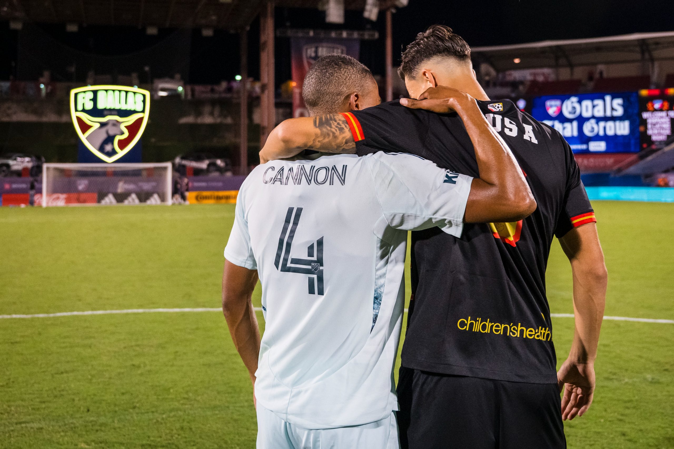 Reggie Cannon and Peta Musa share a moment. Sept 20, 2025. (Courtesy FC Dallas)