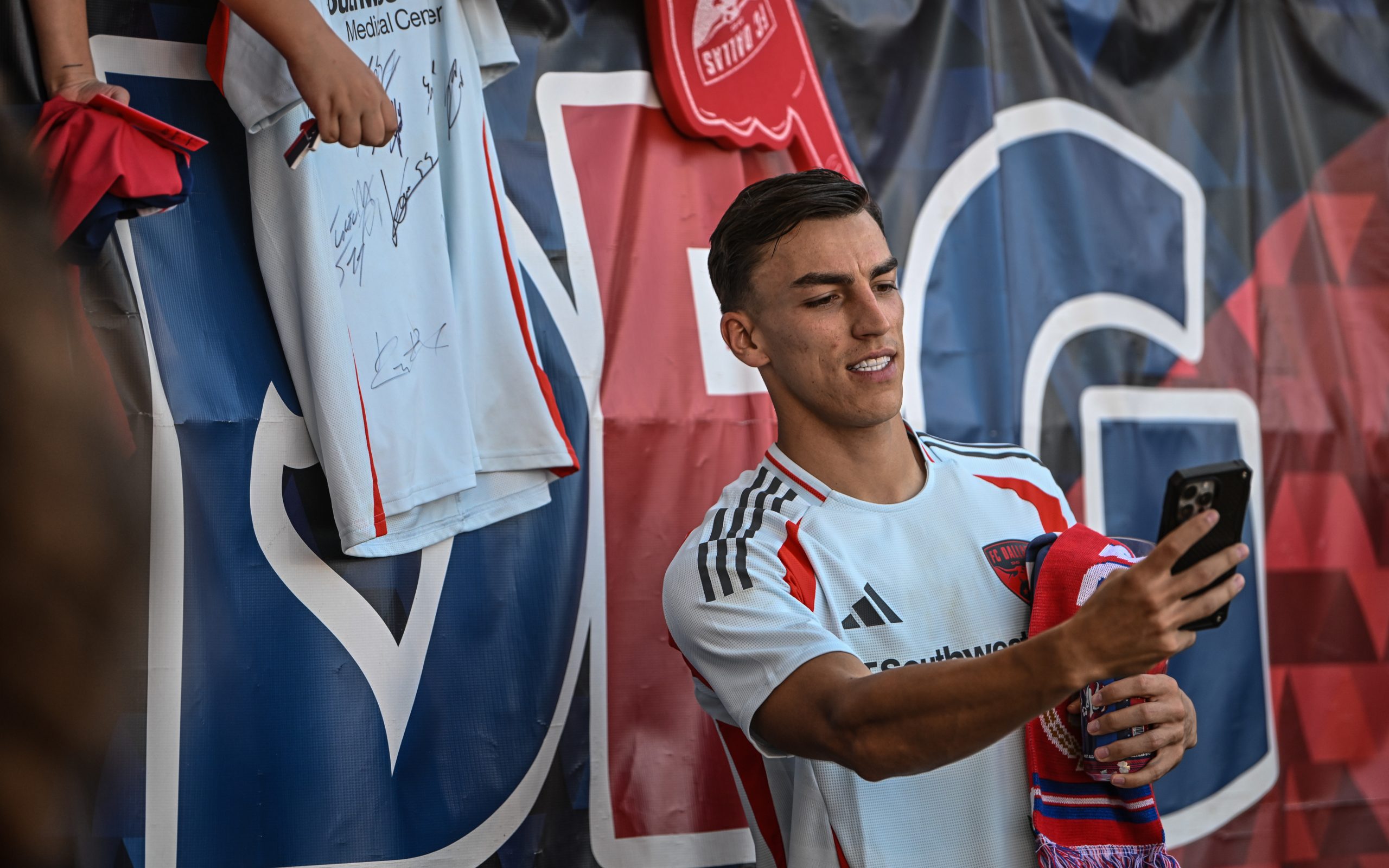 Petar Musa takes a selfie with some fans after the FC Dallas game against LA Galaxy, October 4, 2025. (Mike Brooks, 3rd Degree)