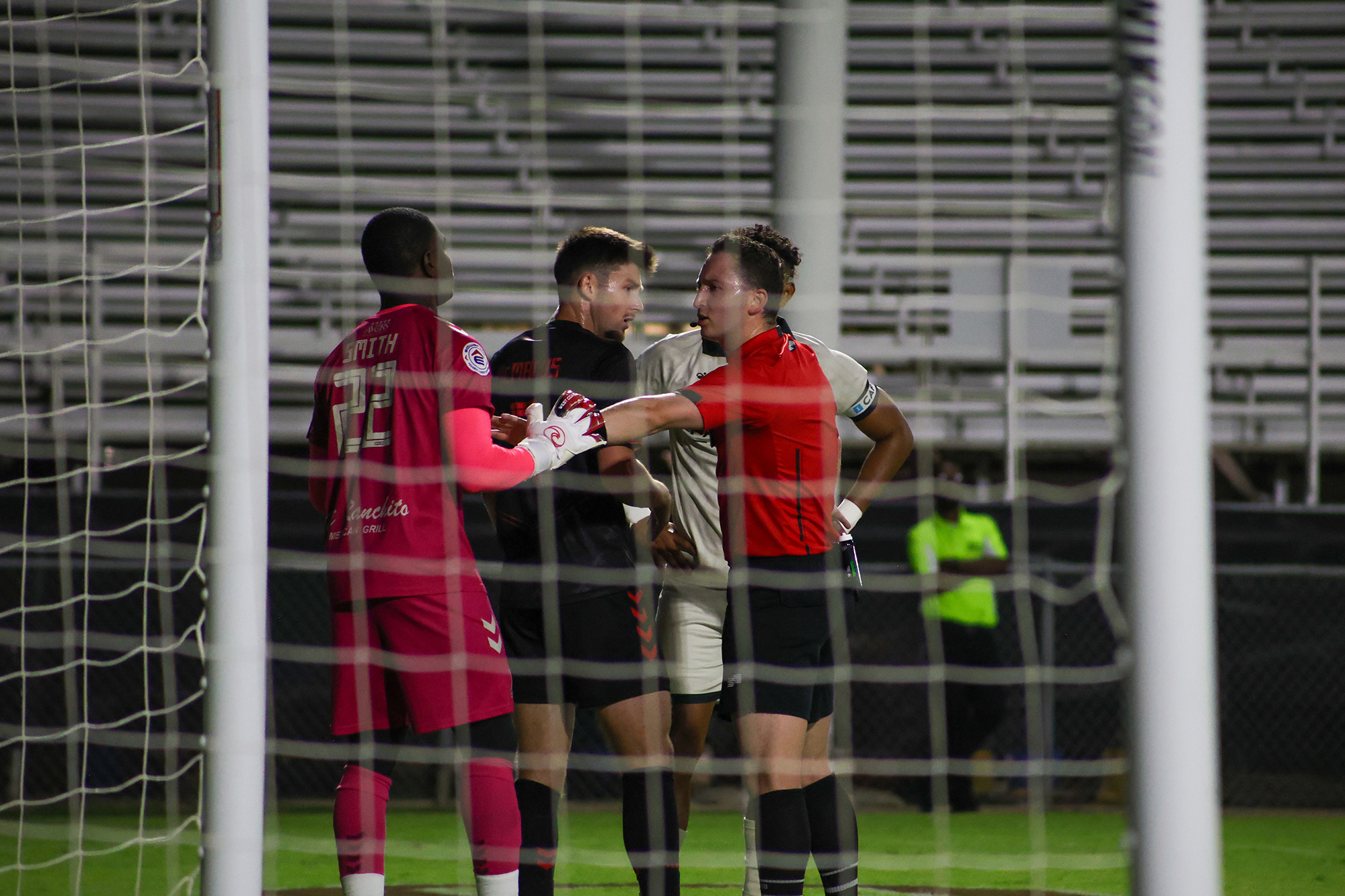 The referee intervenes, Texoma FC vs AV Alta, October 4, 2025. (Beth Spicer, 3rd Degree)