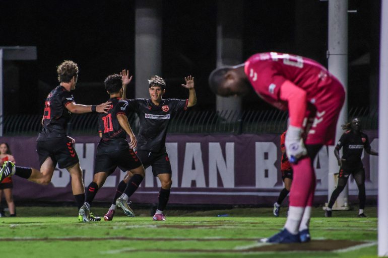 Texoma's Ajmeer Spengler (10) celebrates with this teammates against AV Alta, October 4, 2025. (Beth Spicer, 3rd Degree)